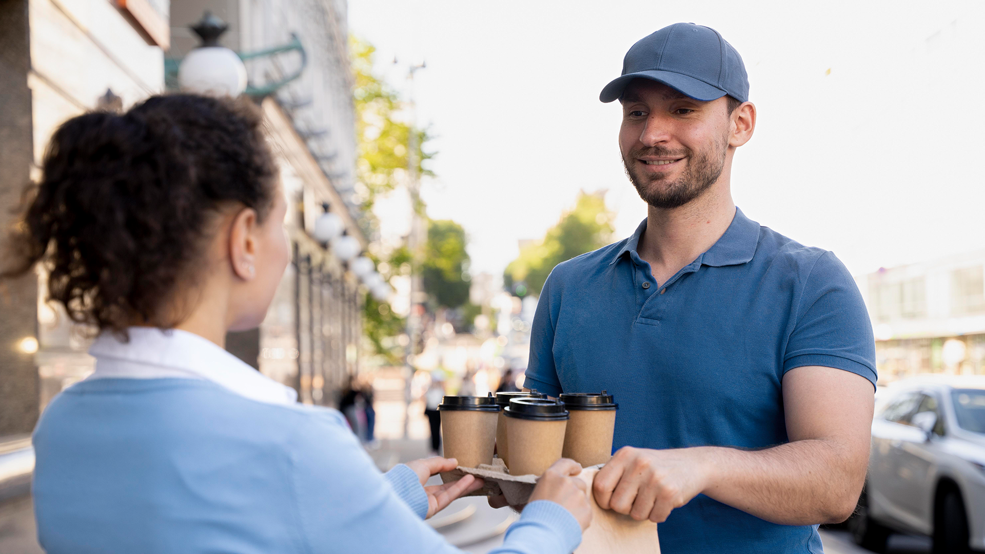 Driver loading deliveries for local shops and cafés